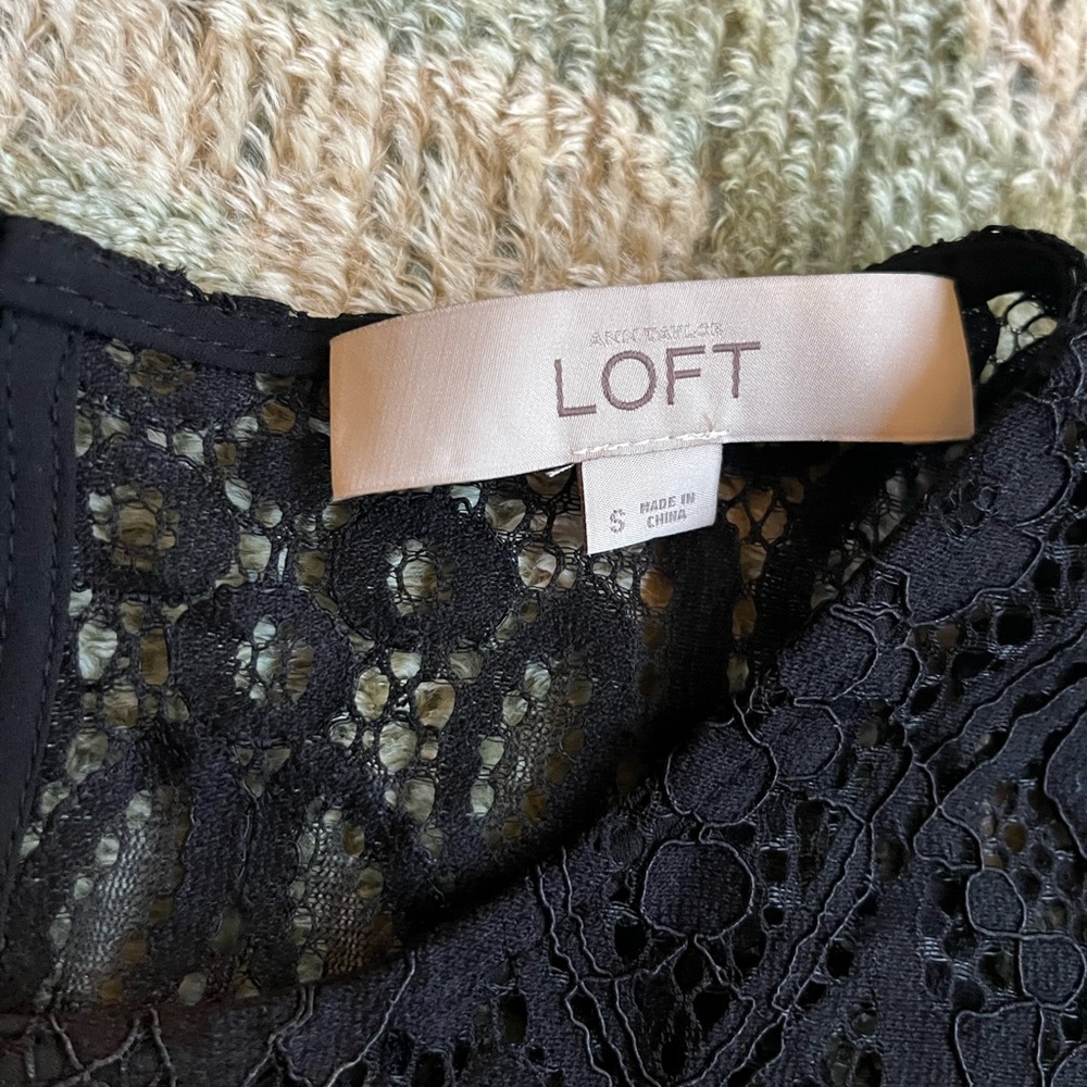 Cute Loft blouse. Partially see through.